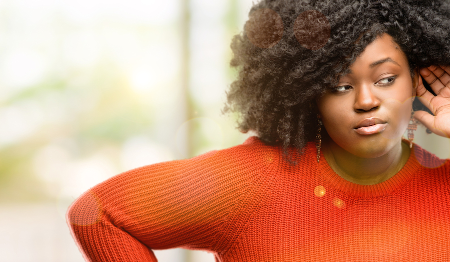 African woman listening